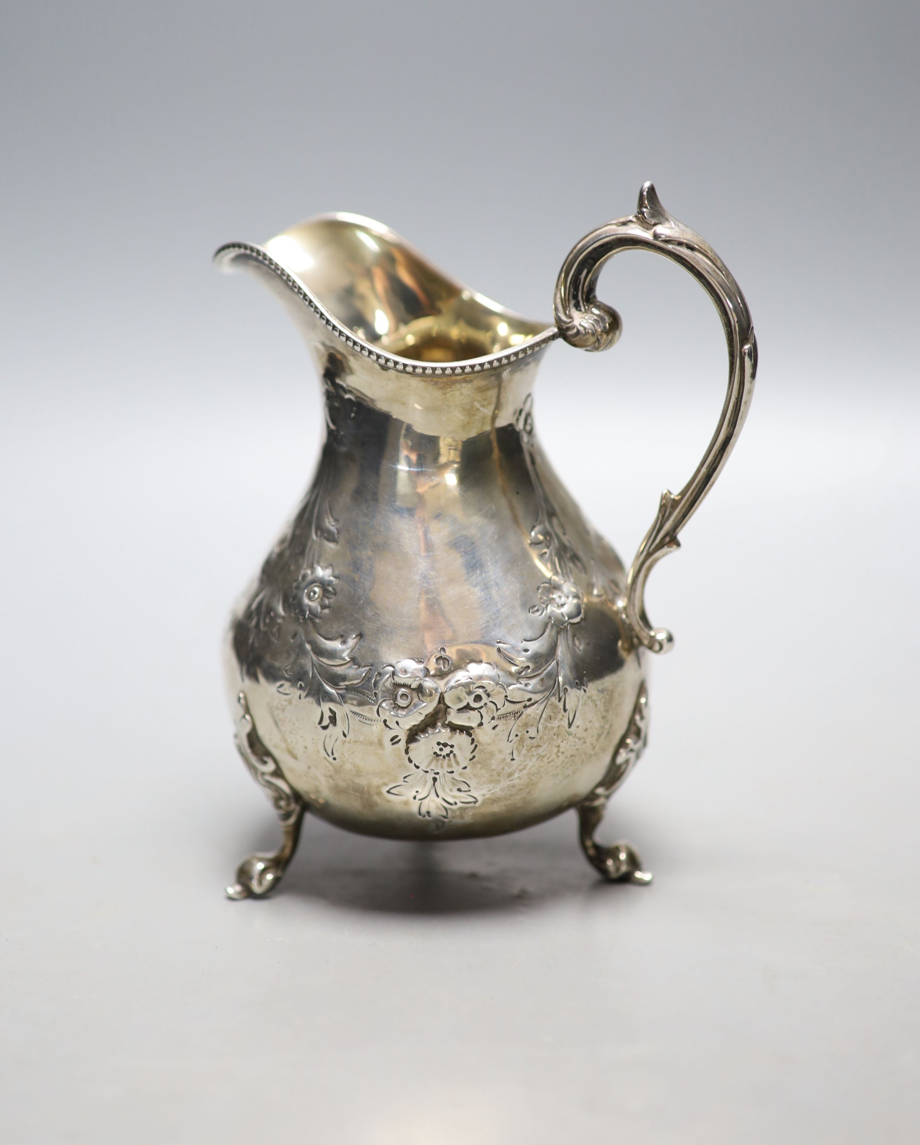 A Victorian silver baluster cream jug, London, 1860, height 13.8cm, 6oz.